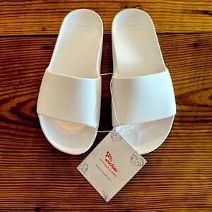 Brand new with tags Archies slides. Size 5